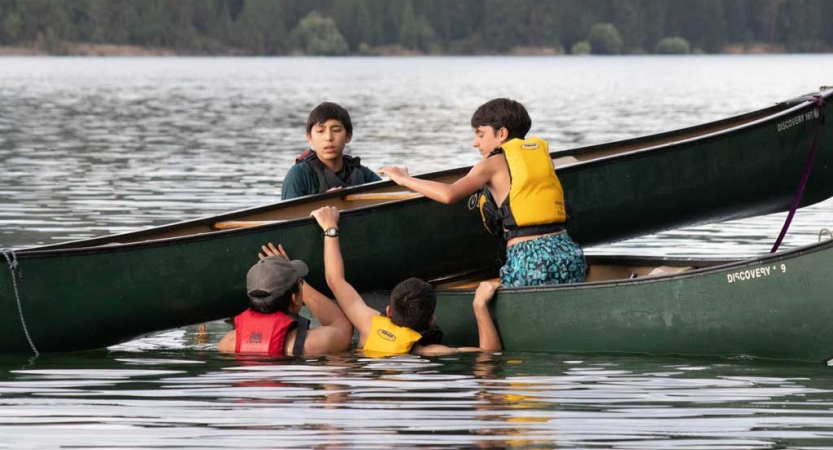 boys canoeing instruction